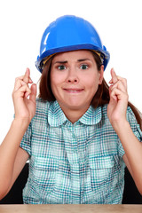 Woman with fingers crossed