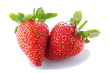 two strawberries on white background