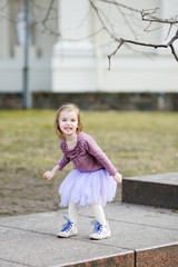 Fototapeta premium Adorable girl having fun on spring
