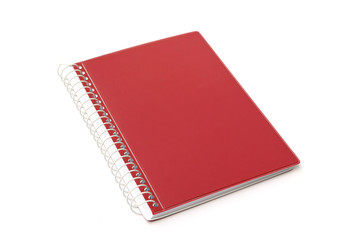 Red notebook isolated on white background