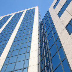 part of office building and blue sky
