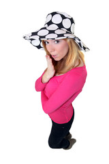 High-angle shot of a woman wearing a funky hat