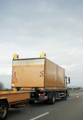 Emergency vehicle on highway inspecting the road