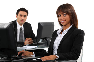 Obraz premium Business professionals working behind their desks