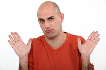 Casual bald man in studio