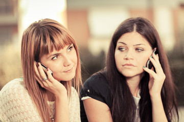 Two Young Women with Mobile Phone