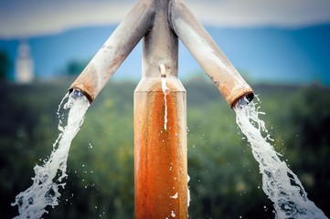 Water flowing from outdoor tap - obrazy, fototapety, plakaty