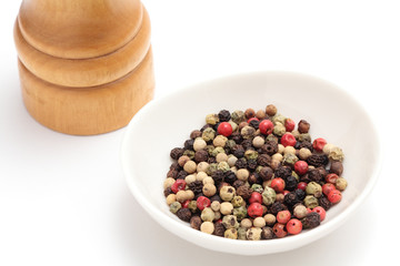 Colorful Peppercorns and Peppermill