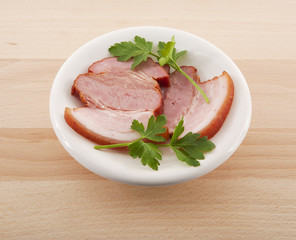 bacon with parsley on dish