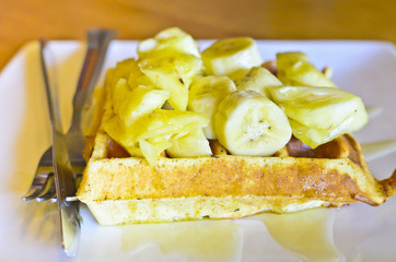 banana and Pineapple waffle on white plate