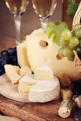 Still life with a variety of cheeses, parmesan, camembert