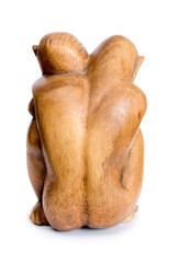 Wooden figurines to hug couple. Rear view.