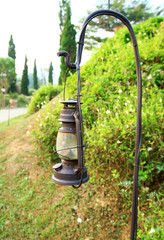 Fototapeta premium Old garden lamp on sidewalk
