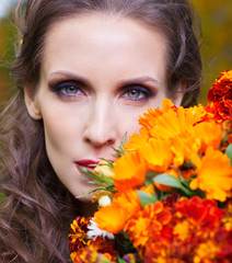 A beautiful brunette with flowers