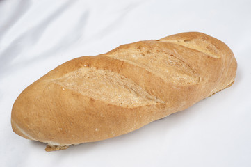 Loaf of bread on white background