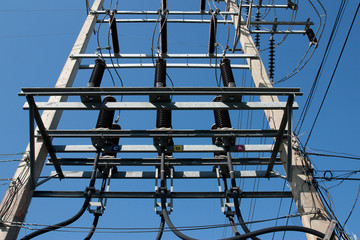 electricity post with blue sky .