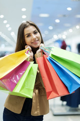 Young woman with shopping bags