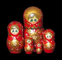 Five Red Painted Russian Nesting Dolls toys isolated