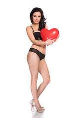 sexy woman holding big heart
