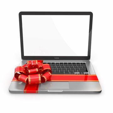 Laptop Gift. Bow And Ribbon On Keyboard