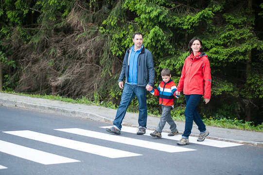 Family crossing the Road