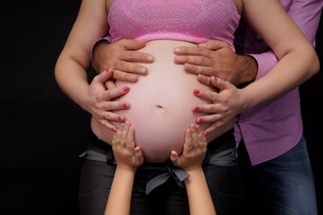 pregnant woman with a family.