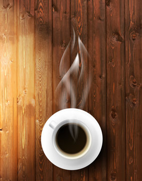 Coffee cup against wooden background.