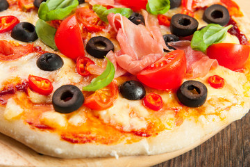 Pizza with ham, pepper and olives - obrazy, fototapety, plakaty