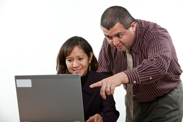 Attractive multi ethnic business man and woman team