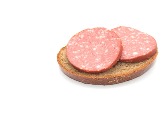 Obraz na płótnie Canvas sausage and bread. sandwich