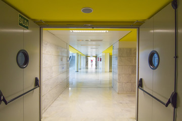 clean and long corridor whith fire doors