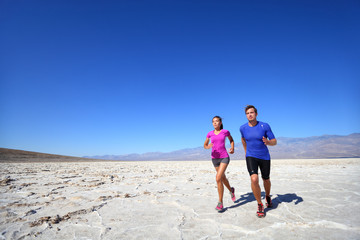 Athletes running sport fitness couple outdoor