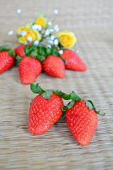 Strawberries on a mat background