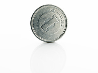 Japanese yen coin isolated on white background