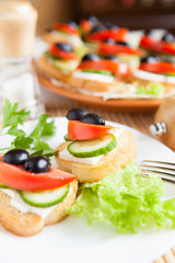 canape with olives and cheese