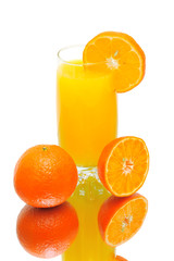 orange juice and tangerines on a white background