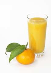 Mandarin and a glass of juice on a white background
