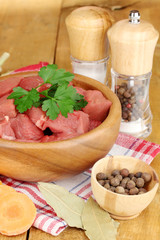 Raw beef meat with herbs and spices