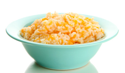 Taste rice porridge with pumpkin in blue bowl, isolated
