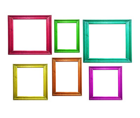 Multicolored wooden picture frames isolated on white