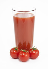 Cherry tomatoes and juice on a white background