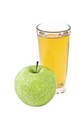 Green apple and a glass of juice on a white background
