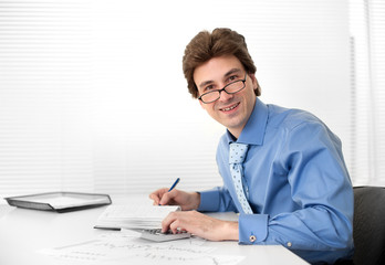 businessman while writing some documents