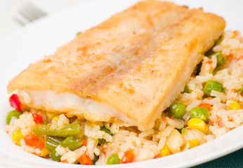 fish fillet with rice and vegetables