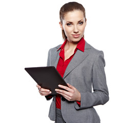 Businesswoman standing in hall with electronic pad