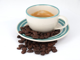 espresso cup and coffee beans