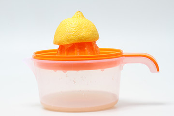 orange and squeezer