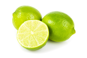 Fresh green limes. Isolated on white