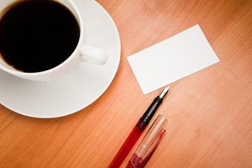 blank card with pencil on coffee cup with space for your data