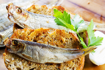 Fish, Spanish tapas - sprats on baked bread